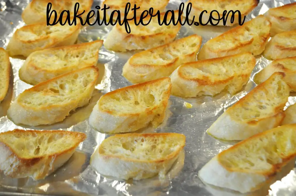 toasted bread slices on a sheet pan