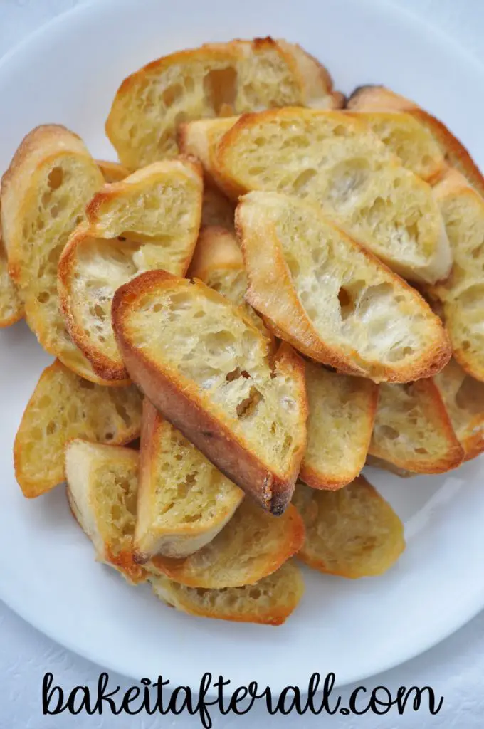 plate piled with toasted bread slices