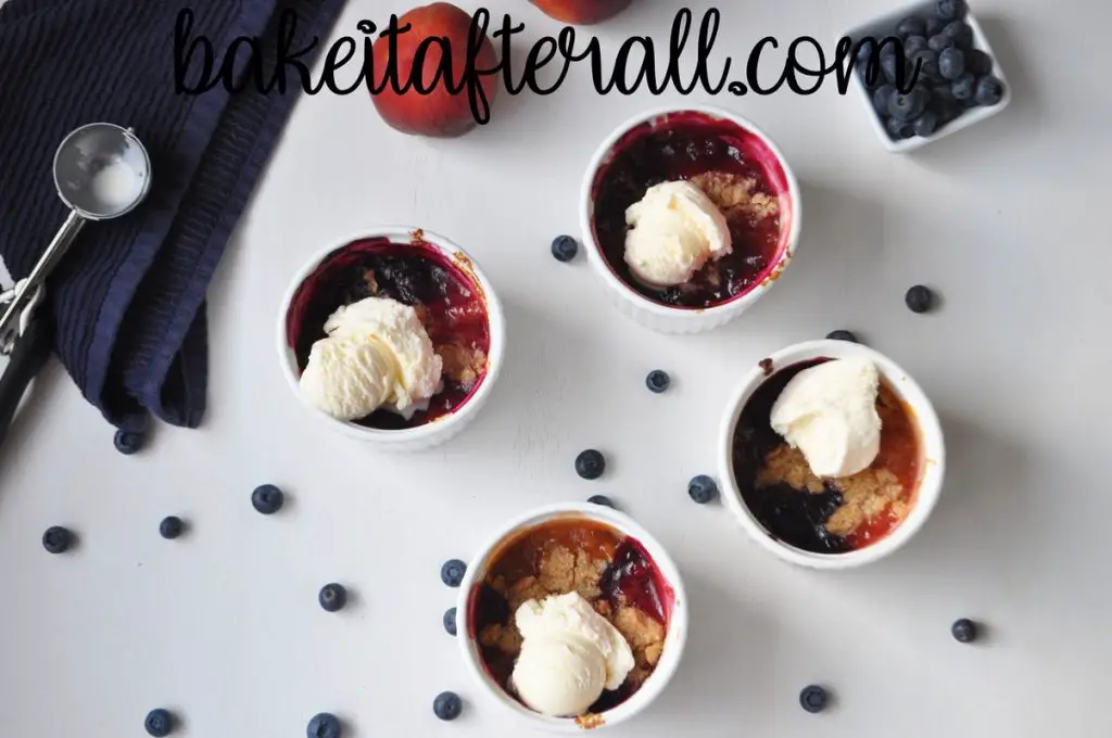 peach blueberry crumbles with ice cream