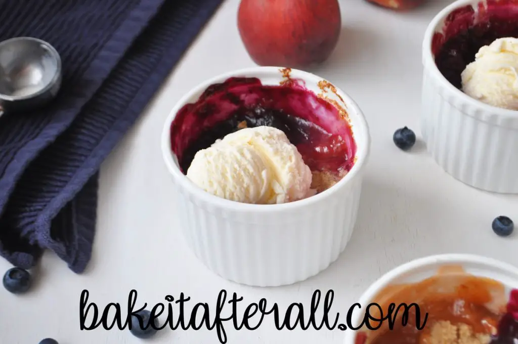peach blueberry crumbles with ice cream