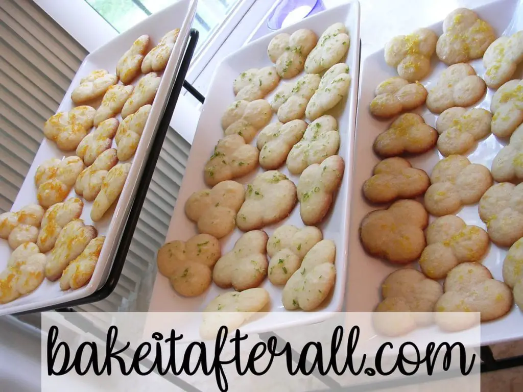 citrus glazed butter cookies on a 3 tiered serving platter