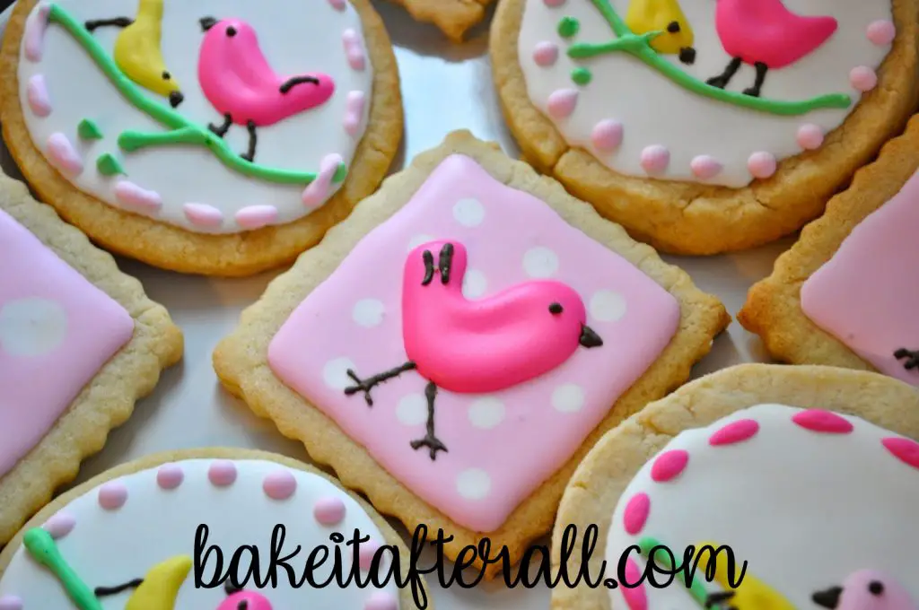 royal icing sugar cookies with cute birds on top