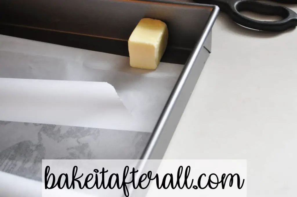 buttering sides of pan for parchment paper to stick