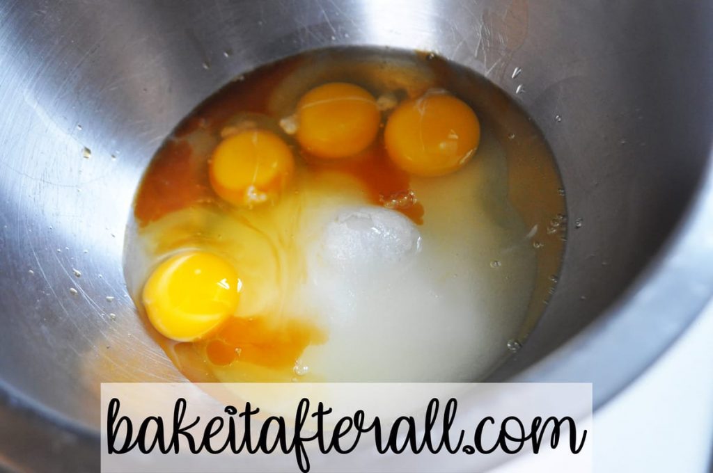 eggs, vanilla, and sugar in bowl