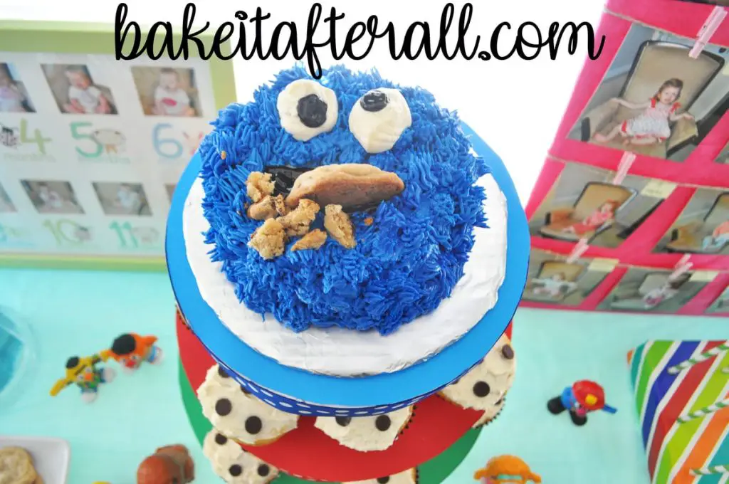 aerial shot of Cookie Monster cake smash cake on Sesame Street dessert table
