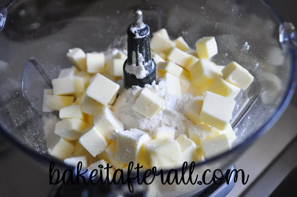 butter pieces scattered over dry ingredients