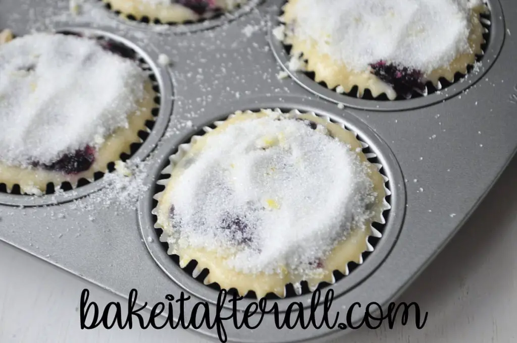 muffin batter with lemon sugar topping before baking