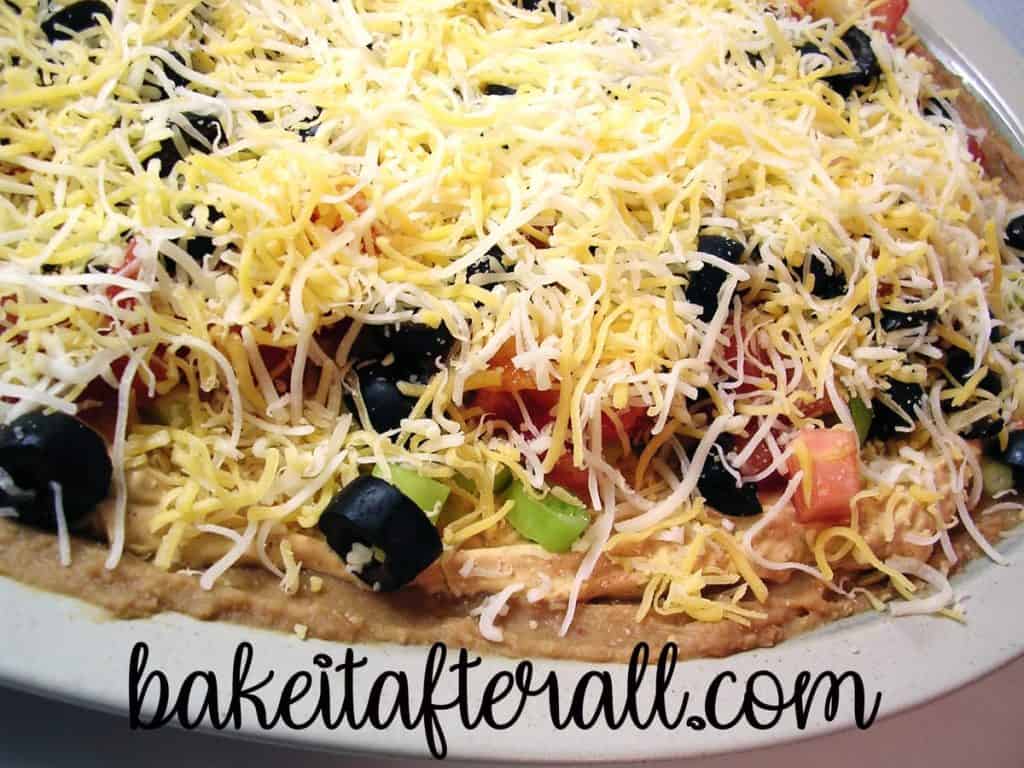 Layered Taco Dip on a plate