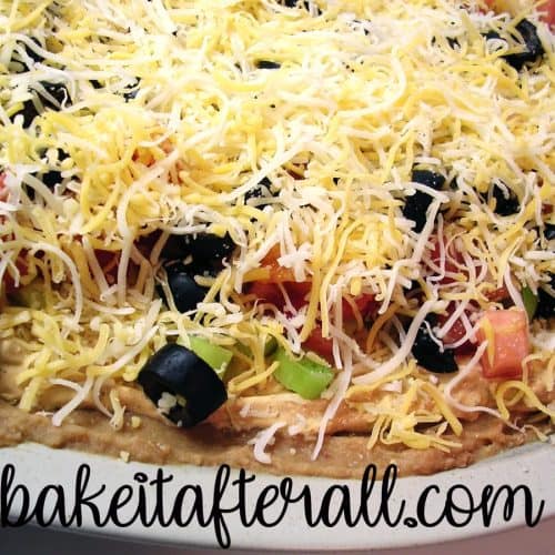 Layered Taco Dip on a plate