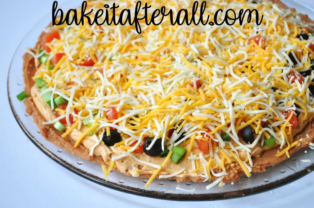 Layered Taco Dip on a platter