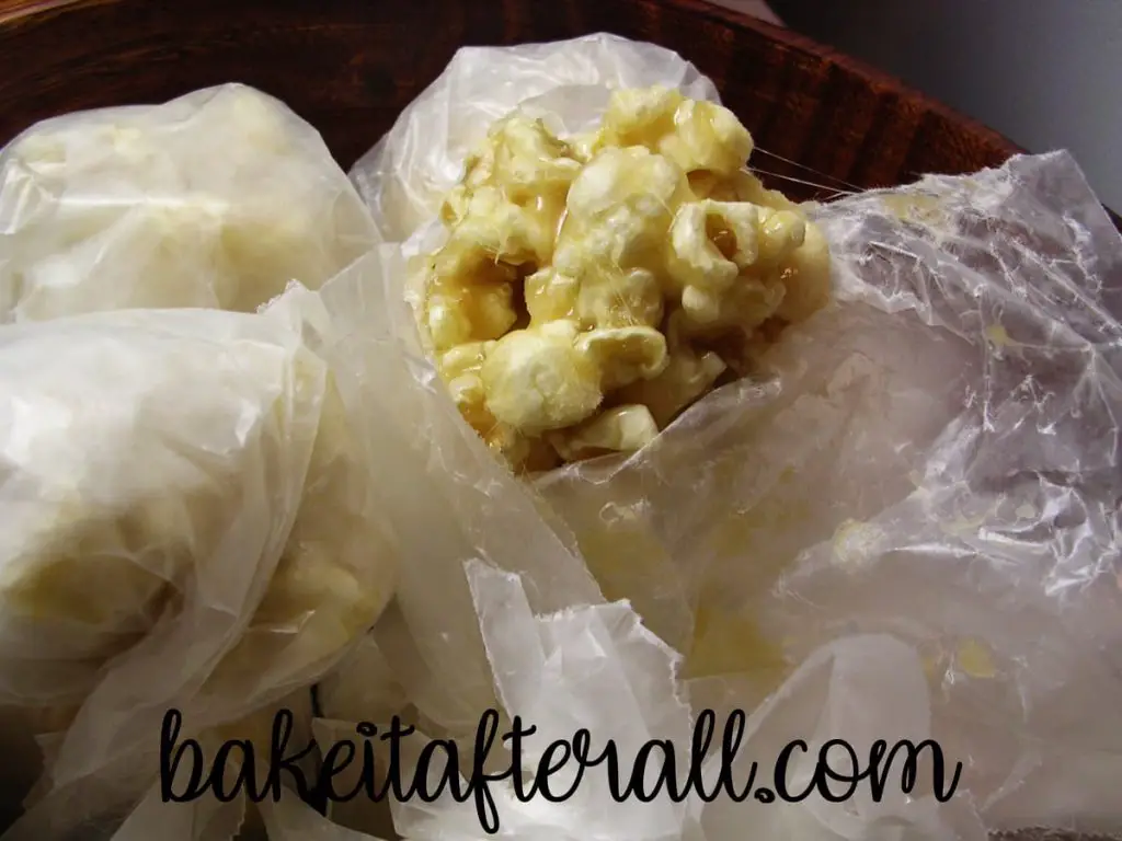 Caramel Popcorn Balls wrapped in wax paper