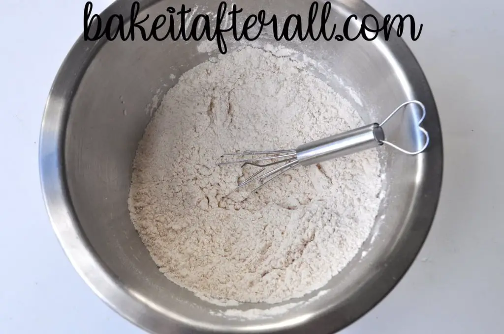 dry ingredients in a bowl with a small wire whisk