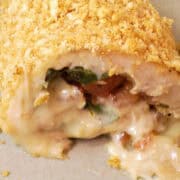 Caprese Stuffed Chicken cut open to see the inside