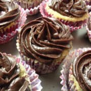 blueberry vanilla cupcakes with blueberry ganache frosting