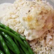 Swiss Cheese Sour Cream Chicken on a bed of rice next to green beans