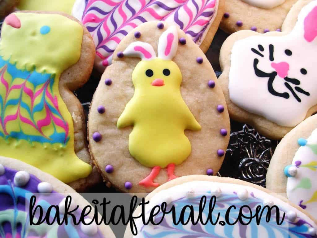 easter chick wearing bunny ears on a cookie