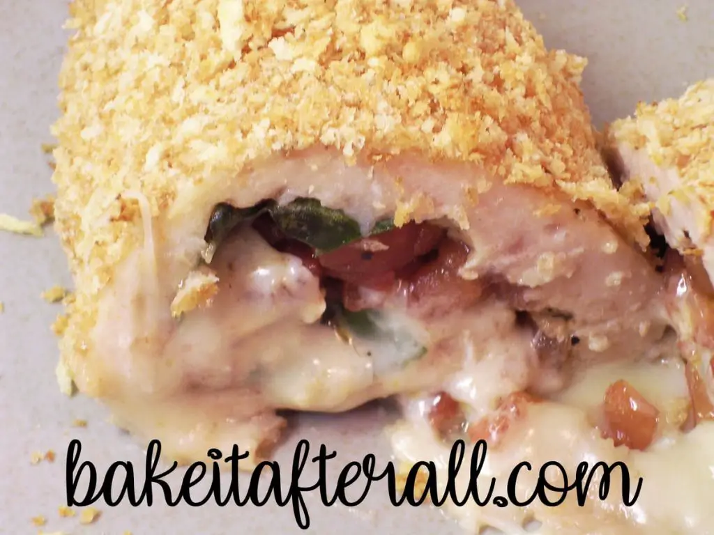 Caprese Stuffed Chicken cut open to see the inside