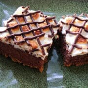S'mores Cheesecake Bars on a green platter