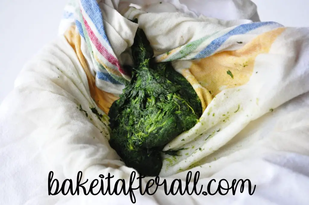spinach squeezed out in a towel