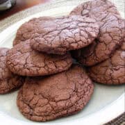 thick and chewy double chocolate cookies on a plate on a table