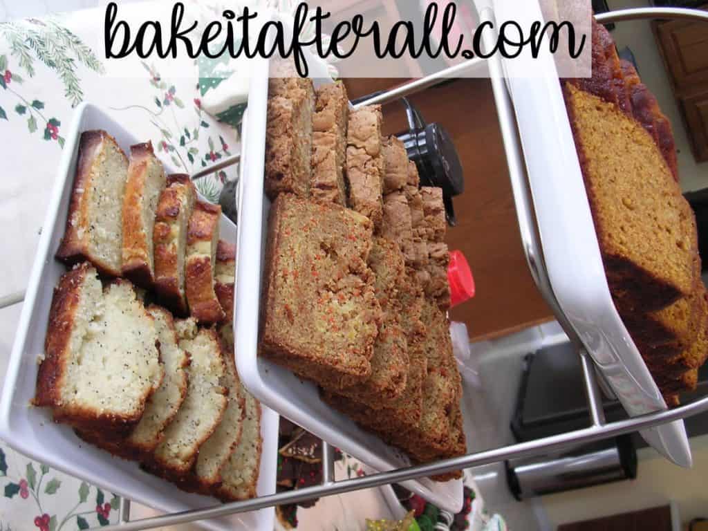 3 level platter with pumpkin bread on top, pineapple carrot bread in the middle, and poppyseed bread on the bottom