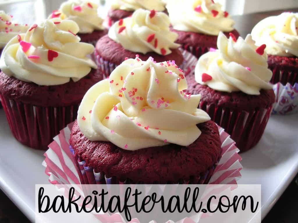 Vanilla Swiss Meringue Buttercream on red velvet cupcakes with Valentine's sprinkles