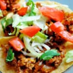 ground turkey tacos with toppings on a plate