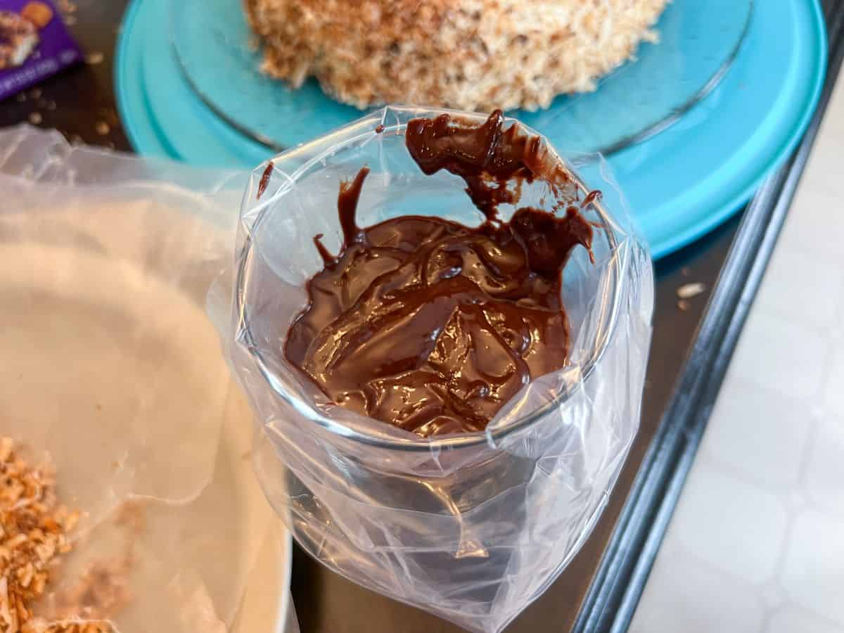 chocolate ganache in a disposable piping bag