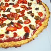 a pizza with a cauliflower pizza crust