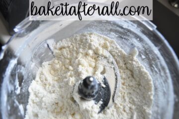 butter pieces the size of peas in a food processor bowl