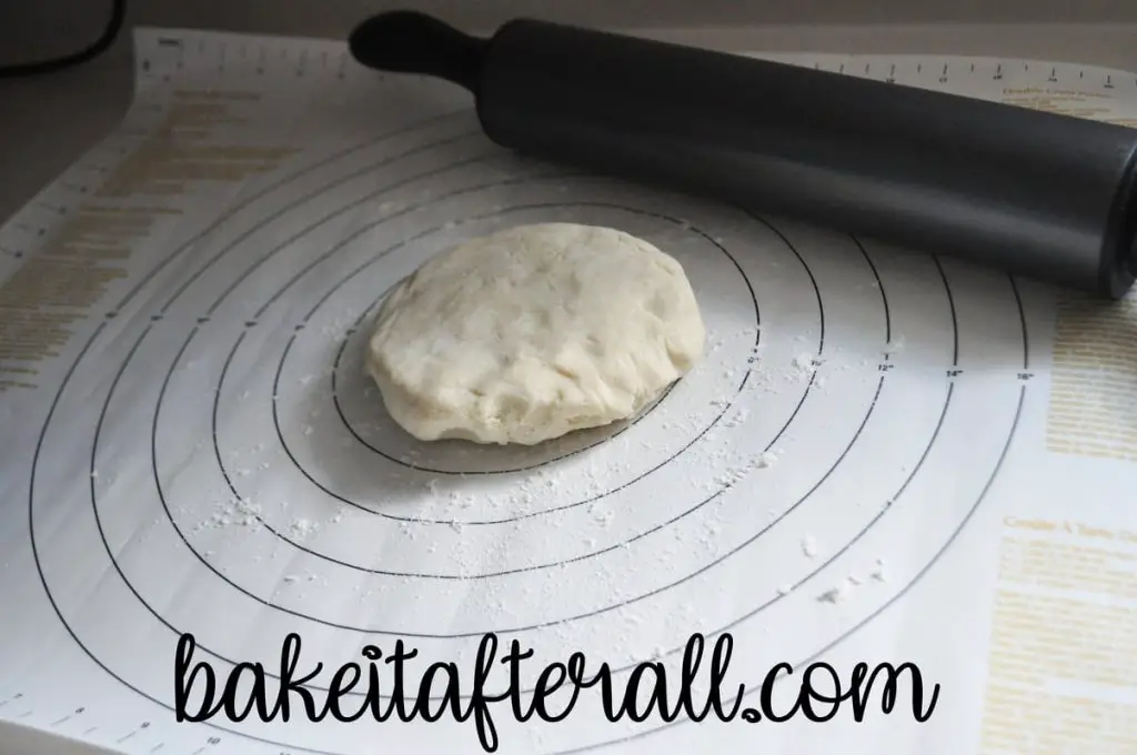 gluten free pie dough on a pastry mat