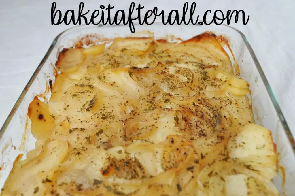 Potatoes and Onions in a glass casserole dish