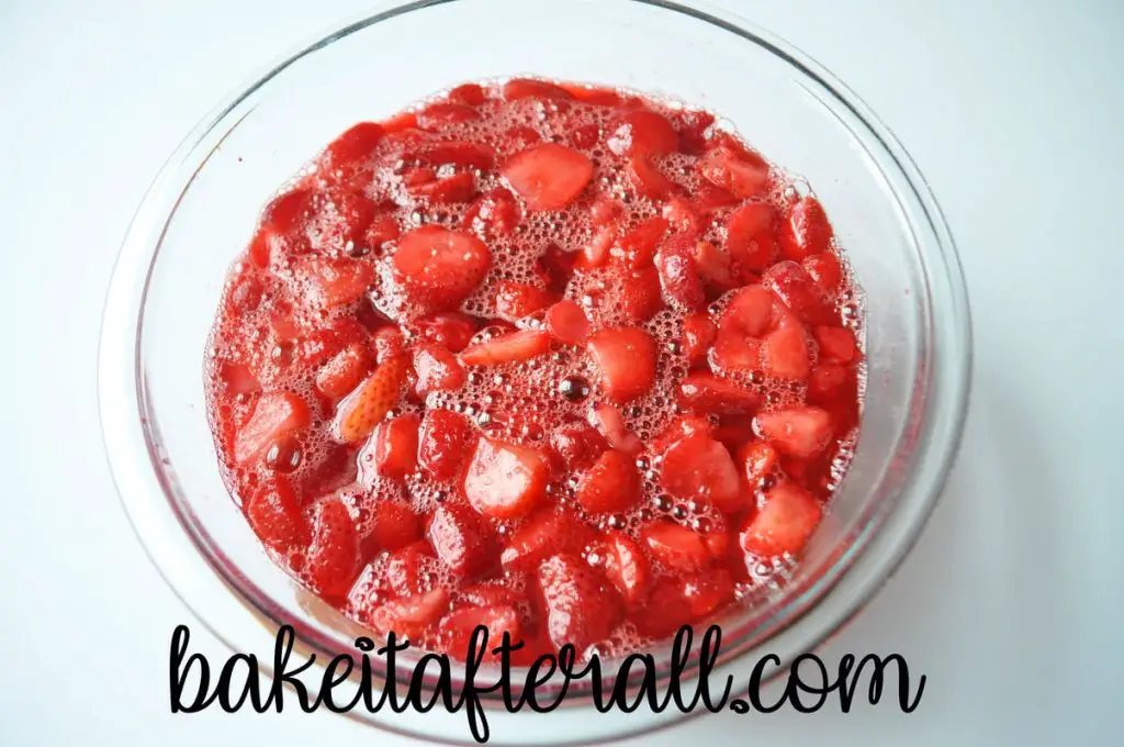 mixed up strawberry jello mixture in a bowl