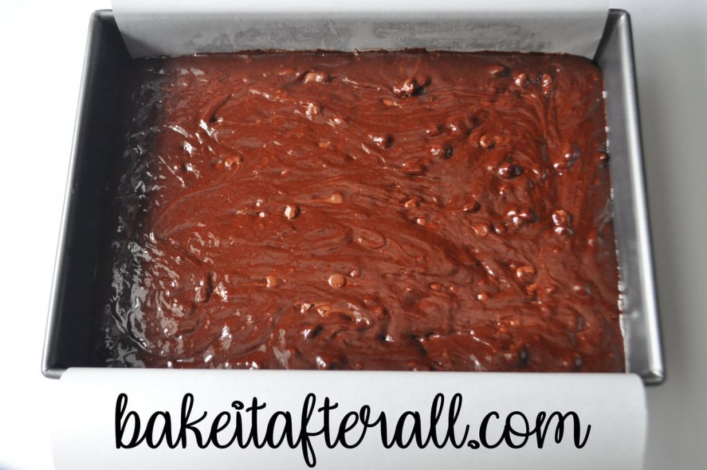 brownie batter in a cake pan