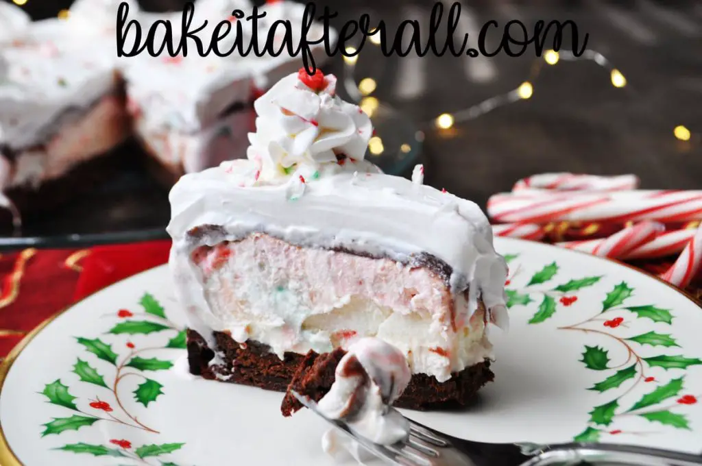 Brownie Peppermint Ice Cream Cake on a plate with a bite on a fork