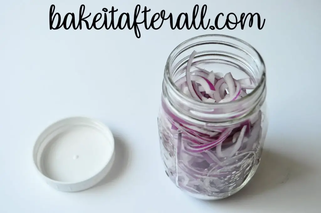 quick pickled onions in a mason jar
