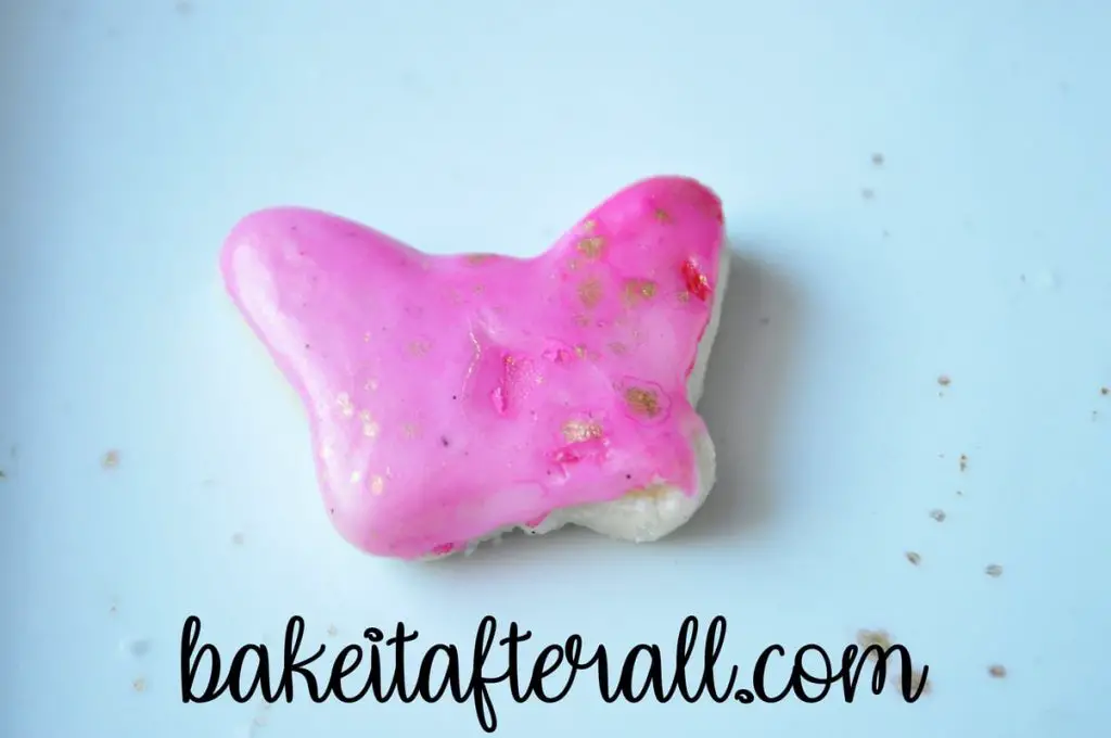 gold splattered painted watercolor cookie