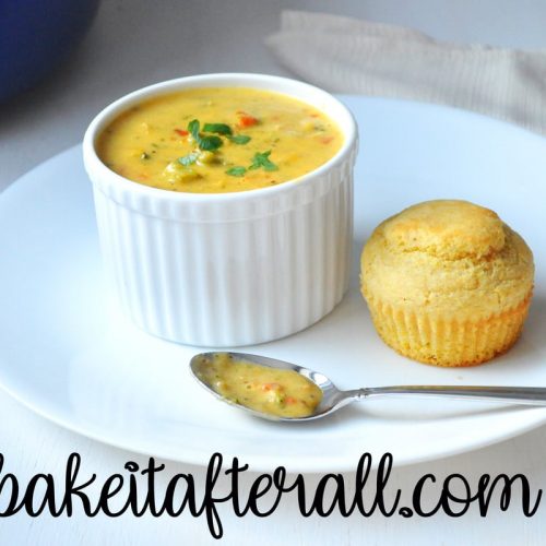 Gluten Free Broccoli Cheddar Soup in a bowl with a cornbread muffin on the side