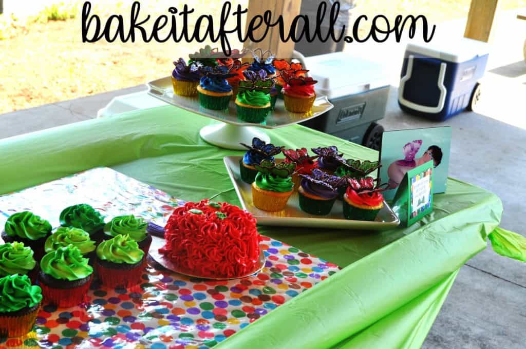 butterfly cupcakes on dessert table