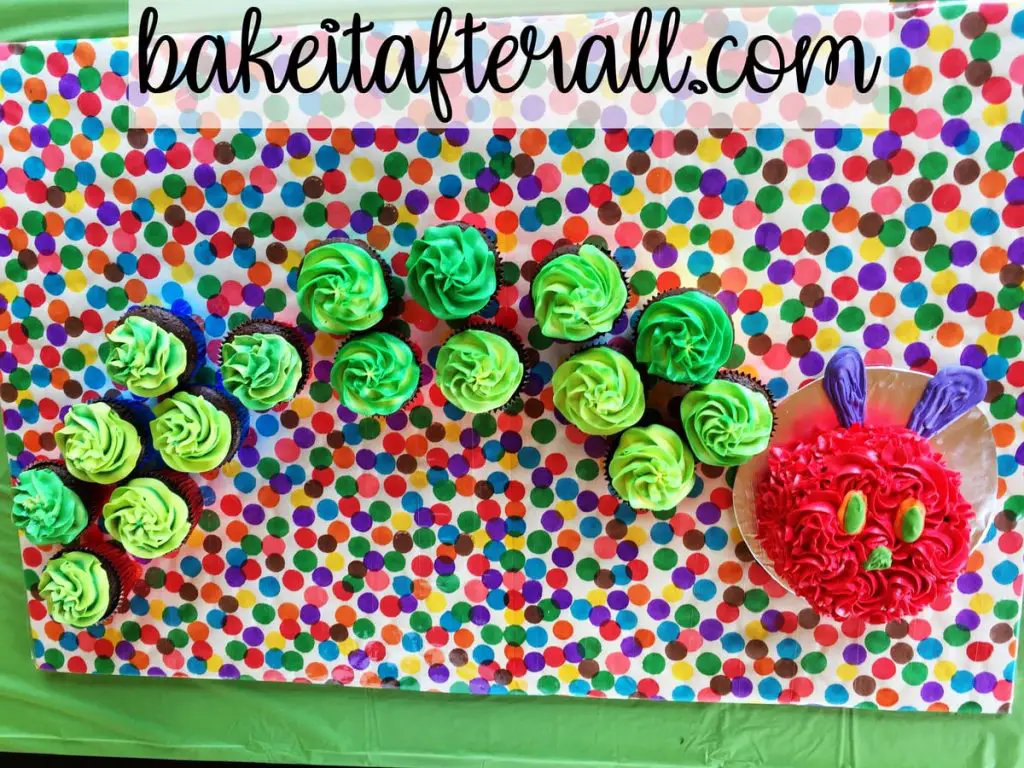 Very Hungry Caterpillar Cupcake Cake on a multi colored dot cake board