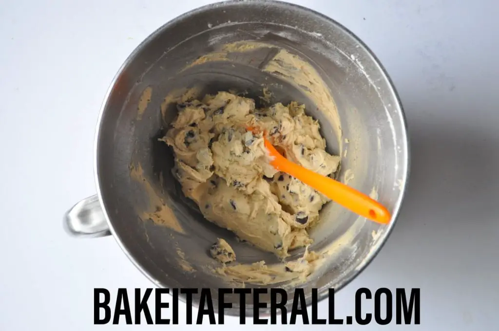 cookie dough in a bowl with small silicone spatula
