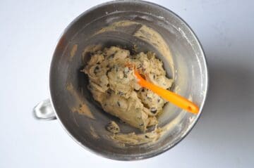 cookie dough in a bowl with small silicone spatula