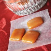 apple cider caramels on waxed paper