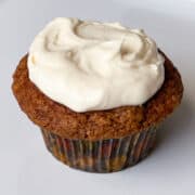 a carrot cupcake with easy cream cheese frosting
