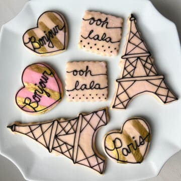 Parisian cookies on a white cake platter