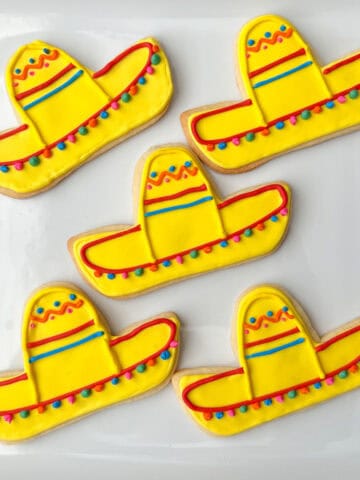 Mexican sombrero cookies on a white plate