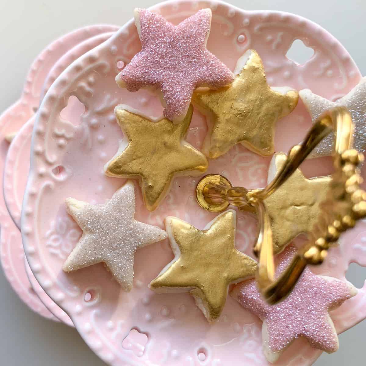 Gold Painted Cookies on a pink 3-tiered server