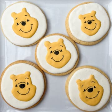 Winnie the Pooh Sugar Cookies on a white plate