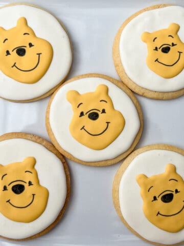 Winnie the Pooh Sugar Cookies on a white plate