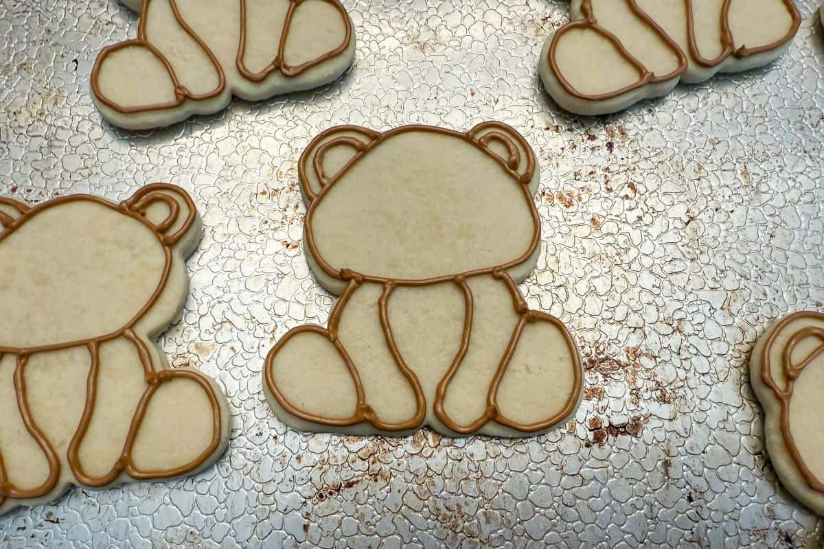 teddy bear cookies outlined with brown royal icing